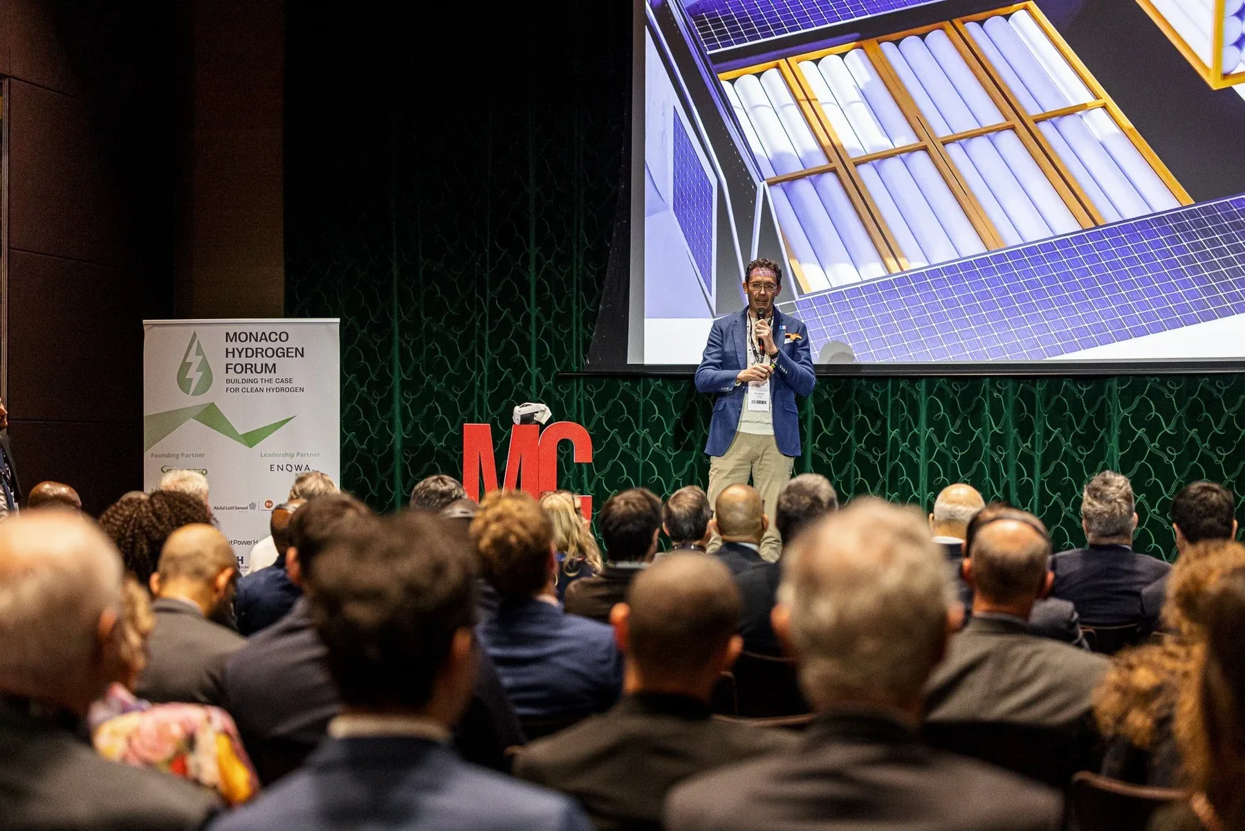 Ben Medland pitching on stage at the Monaco Prize