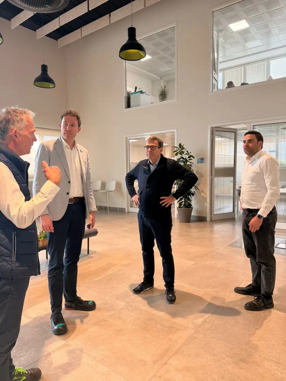 The DRIFT and Enapter teams talking before the factory tour at Enapter’s Pisa facility