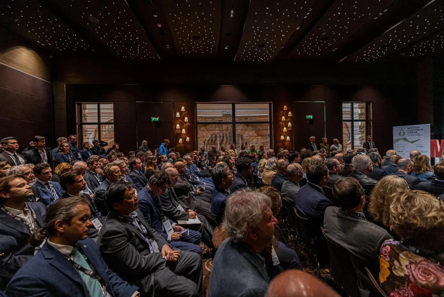 A packed room of delegates at the Monaco Prize