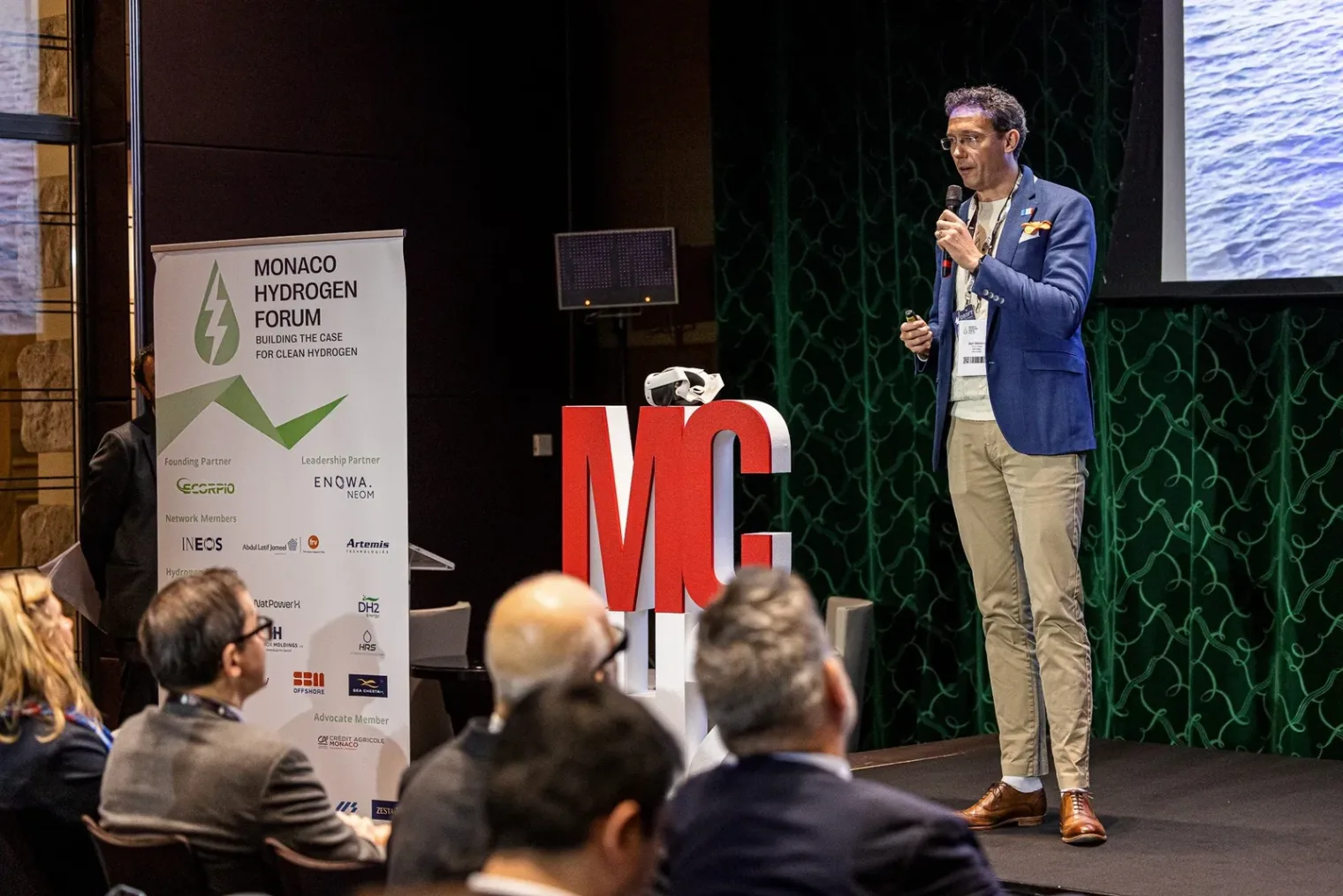 Ben Medland pitching on stage at the Monaco Prize